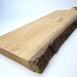 Hand-made teak food board (bark side)